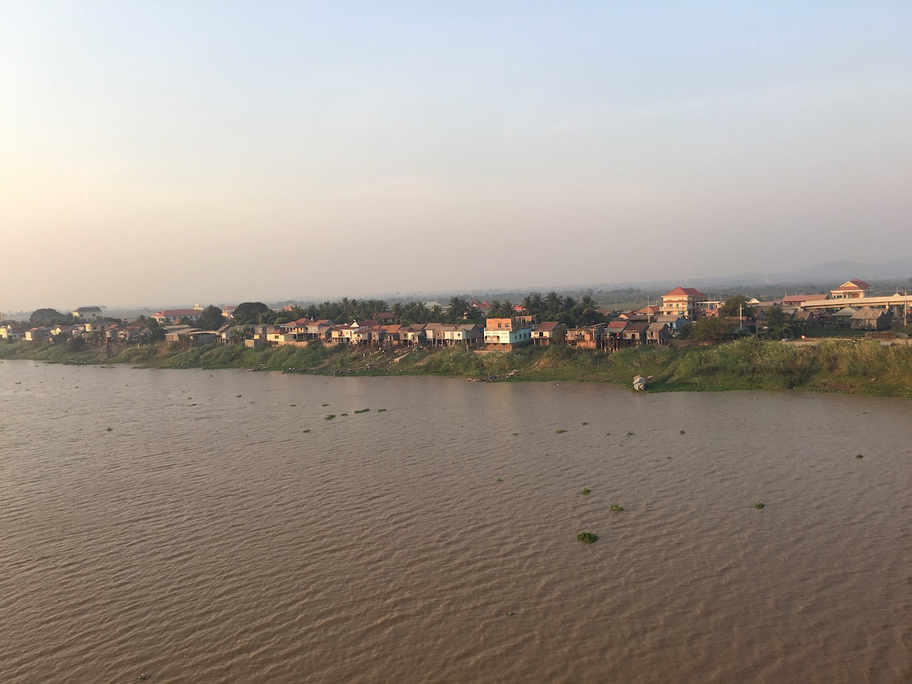 Crossing the Tonlé Sap River. The river reverses course during the rainy season as the Mekong swells, filling up the lake. In the dry season, the lake empties out back into the Mekong.