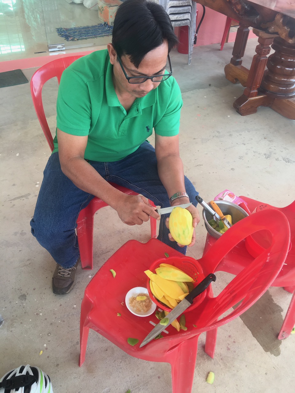 Our support driver carving up some mangoes. We dipped them a palm sugar/salt mix.