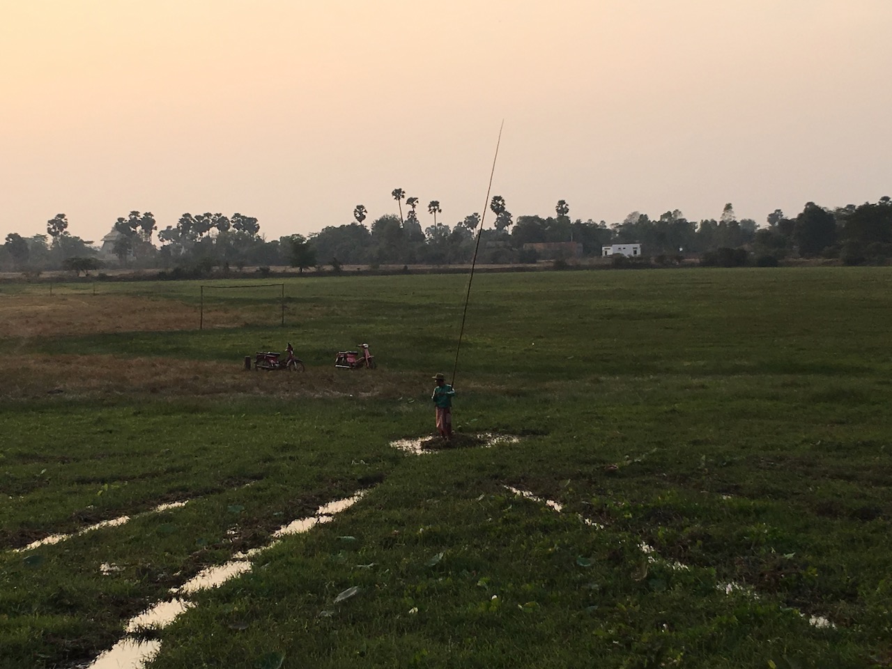 The support car driver from Pursat and I were really curious about this kind of fishing.