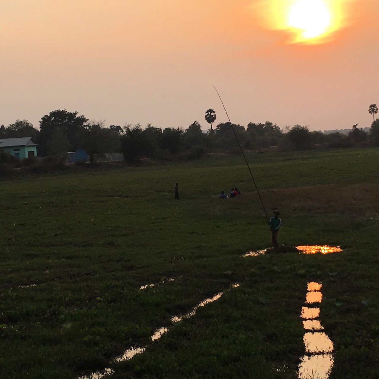 The support car driver from Pursat and I were really curious about this kind of fishing.