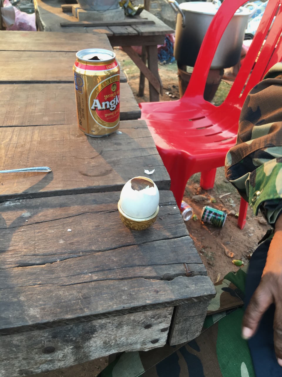 ពងទាកូន or paung tea kaun, otherwise known as balut, is a fertilized developing egg embryo that is boiled or steamed and eaten from the shell. It is usually incubated for 18–20 days. The father gave me a beer, but I politely declined the balut.