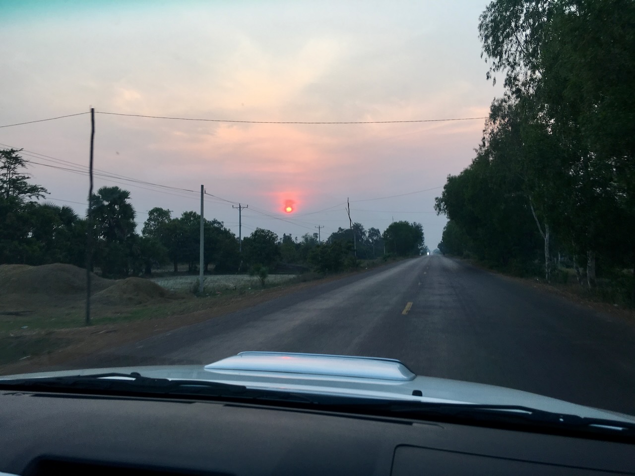 Riding into the sunset on the Highway 5 back to Pursat