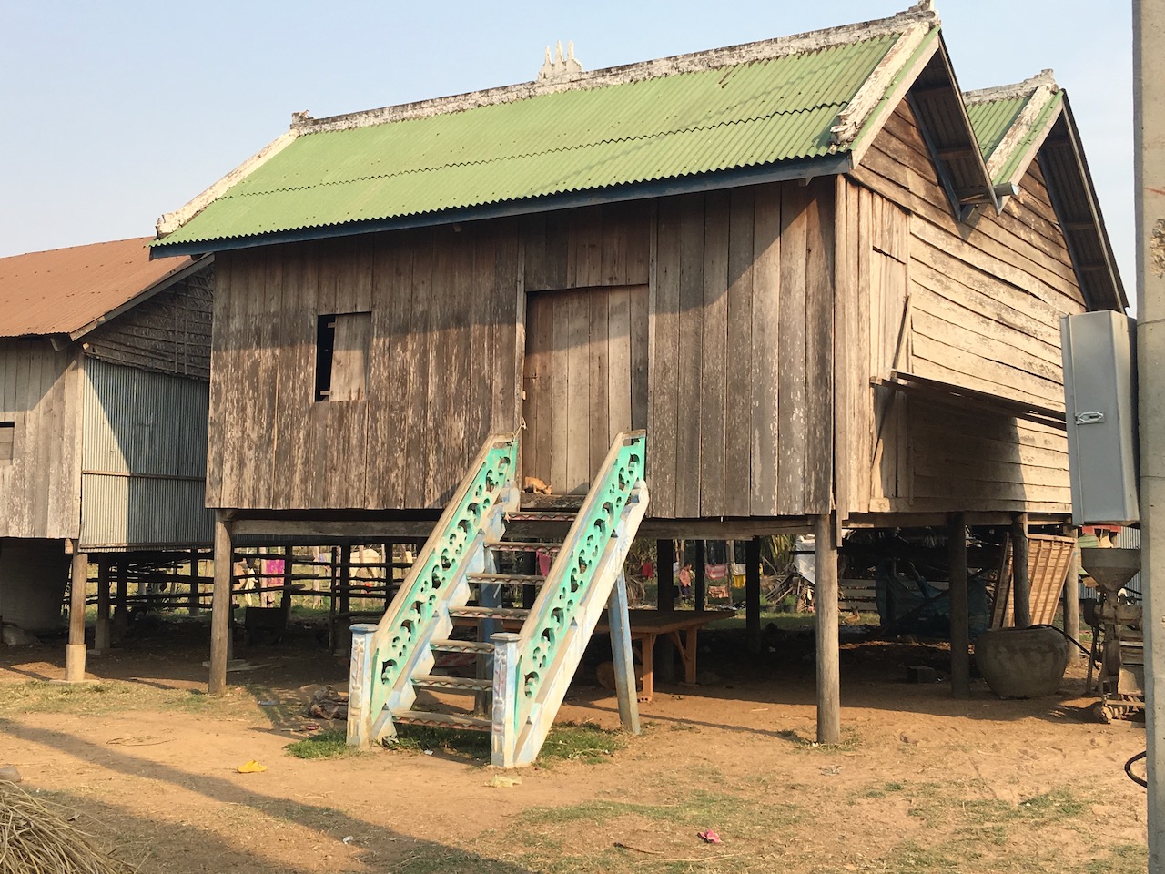 This style of house was really common north of the Tonlé Sap. I liked the banisters going up to the front door.