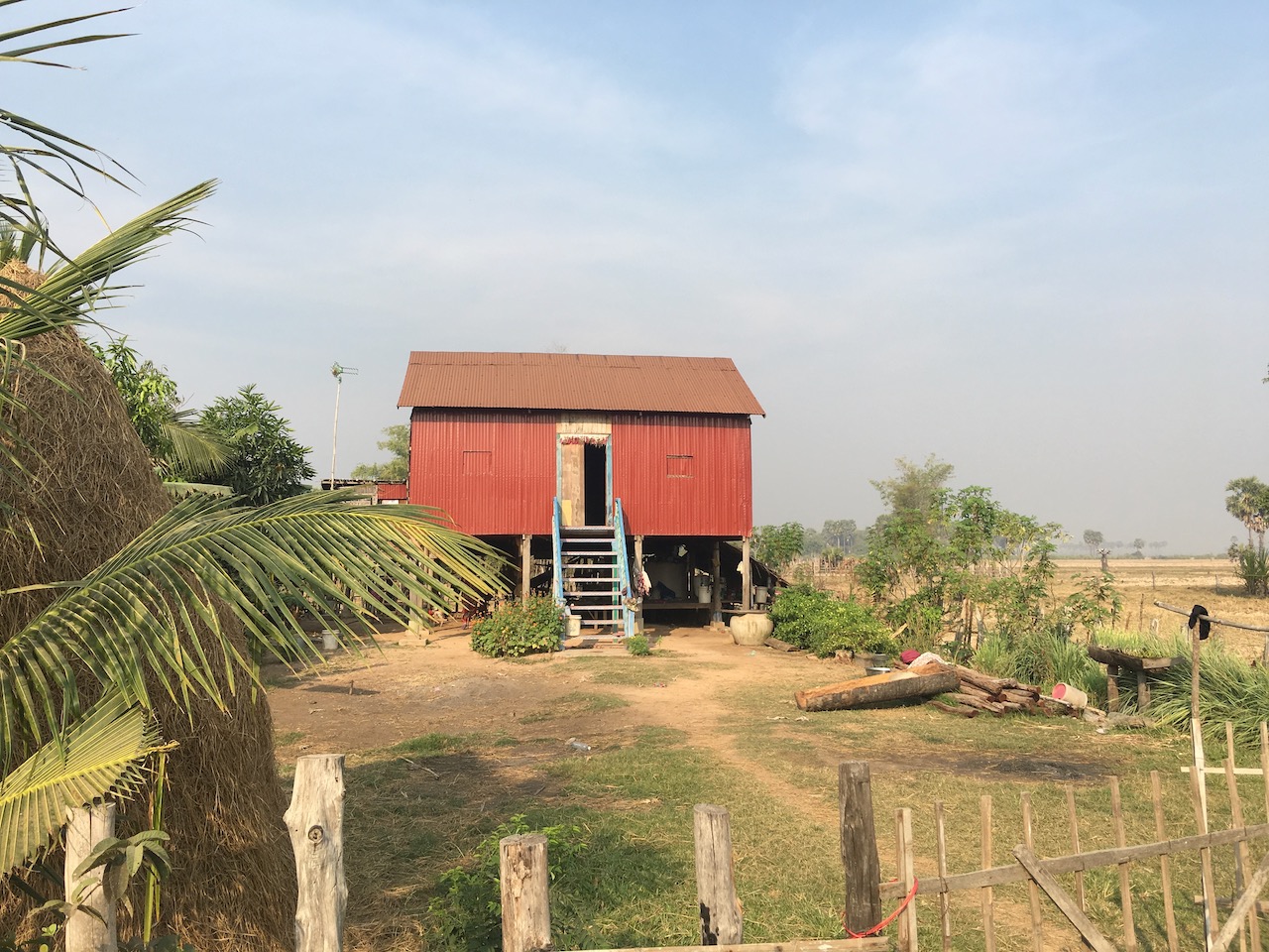 This style of house was really common north of the Tonlé Sap. I liked the banisters going up to the front door.