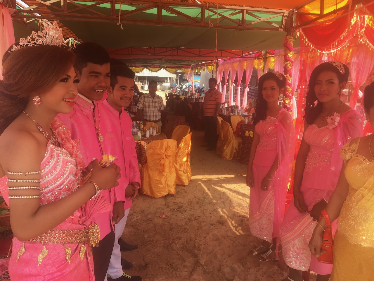 Cambodian wedding reception. I think the bride and groom are on the left.